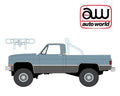 (Coming Soon) Auto World 1987 Chevy Silverado Fleetside 4×4 w/Roll Bar & Push Bar- Light Blue
