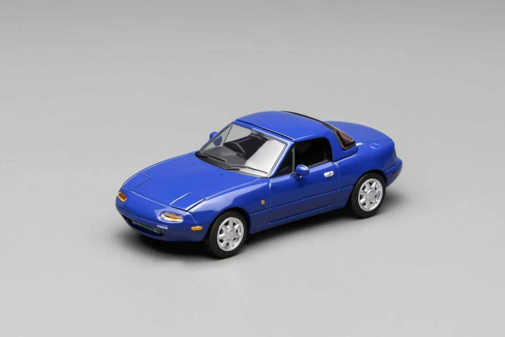 (Coming Soon) MOTORHELIX 1:64 Mazda MX-5 Miata (NA)LHD - Laguna Blue