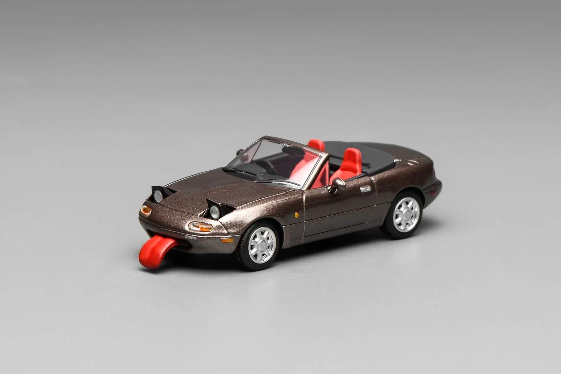 (Coming Soon) MOTORHELIX 1:64 Mazda MX-5 Miata (NA)LHD - Metallic Brown