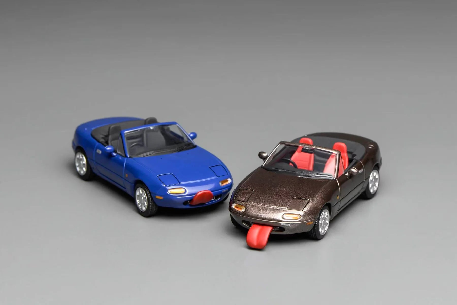 (Coming Soon) MOTORHELIX 1:64 Mazda MX-5 Miata (NA)LHD - Metallic Brown