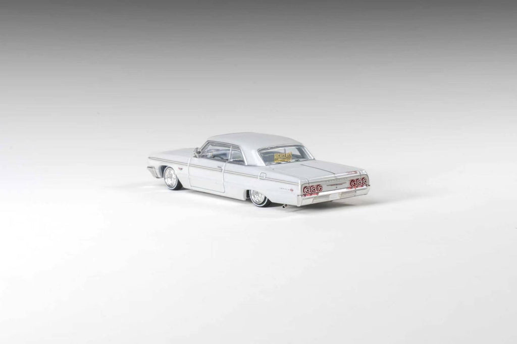 (Coming Soon) 97M 1:64 1964 Chevrolet Impala Low Rider Pearl White
