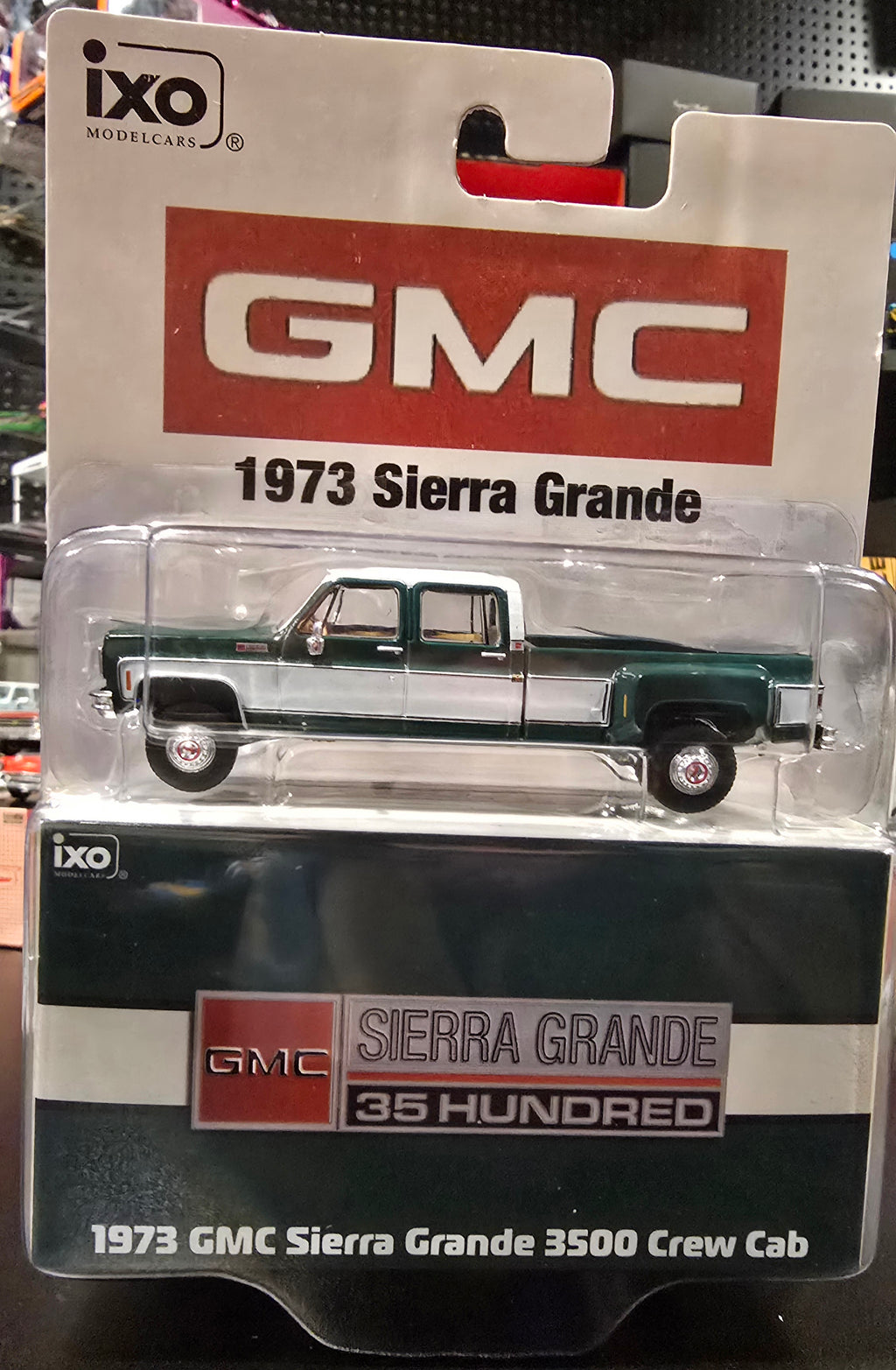 IXO America 1:64 Scale 1973 GMC Sierra Grande 3500 Crew Cab Dually - Glenwood Green and Frost White