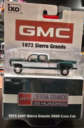 IXO America 1:64 Scale 1973 GMC Sierra Grande 3500 Crew Cab Dually - Glenwood Green and Frost White
