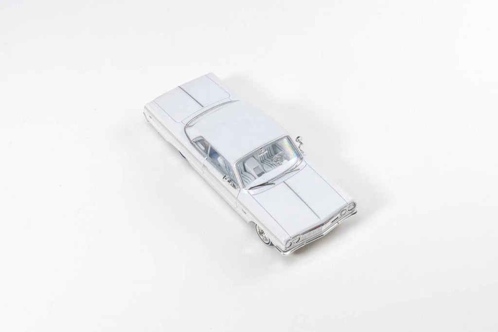 (Coming Soon) 97M 1:64 1964 Chevrolet Impala Low Rider Pearl White