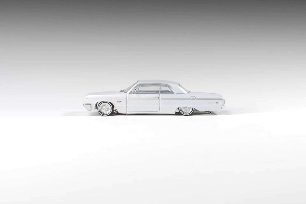 (Coming Soon) 97M 1:64 1964 Chevrolet Impala Low Rider Pearl White
