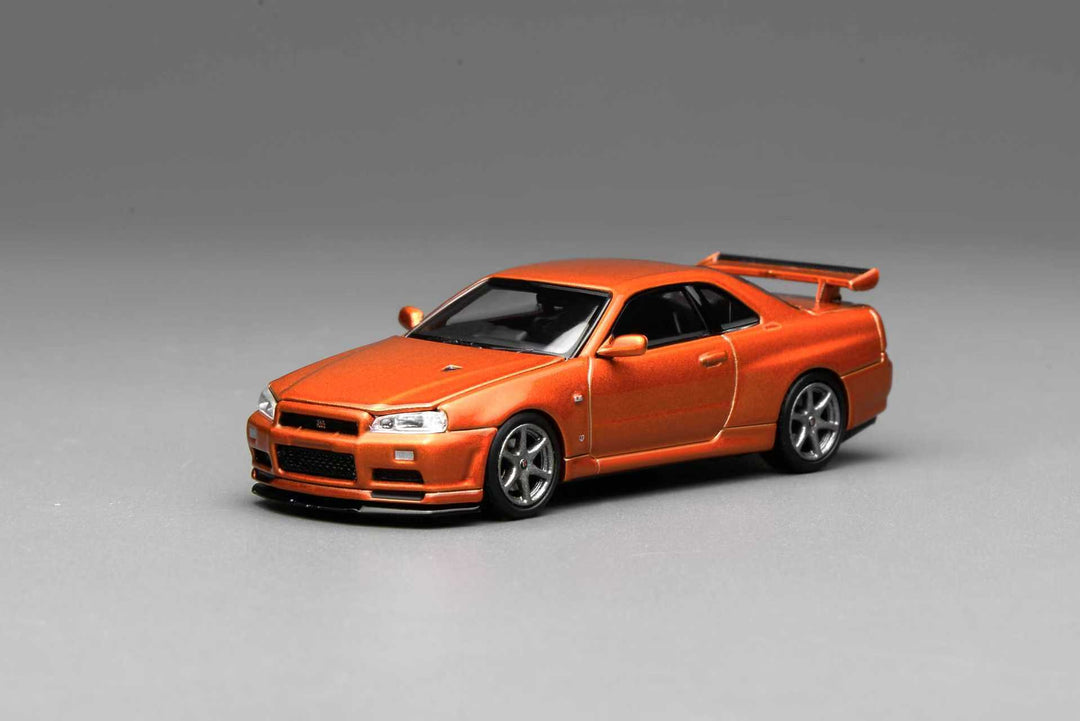 (Coming Soon) MOTORHELIX 1:64 Nissan Skyline GT-R(R34) V-Spec ll Customized Metallic Orange