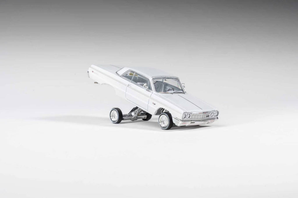 (Coming Soon) 97M 1:64 1964 Chevrolet Impala Low Rider Pearl White