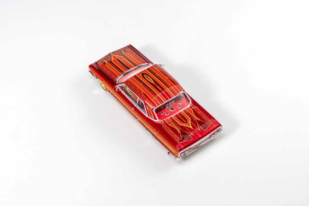(Coming Soon) 97M 1:64 1964 Chevrolet Impala Low Rider Transparent Red