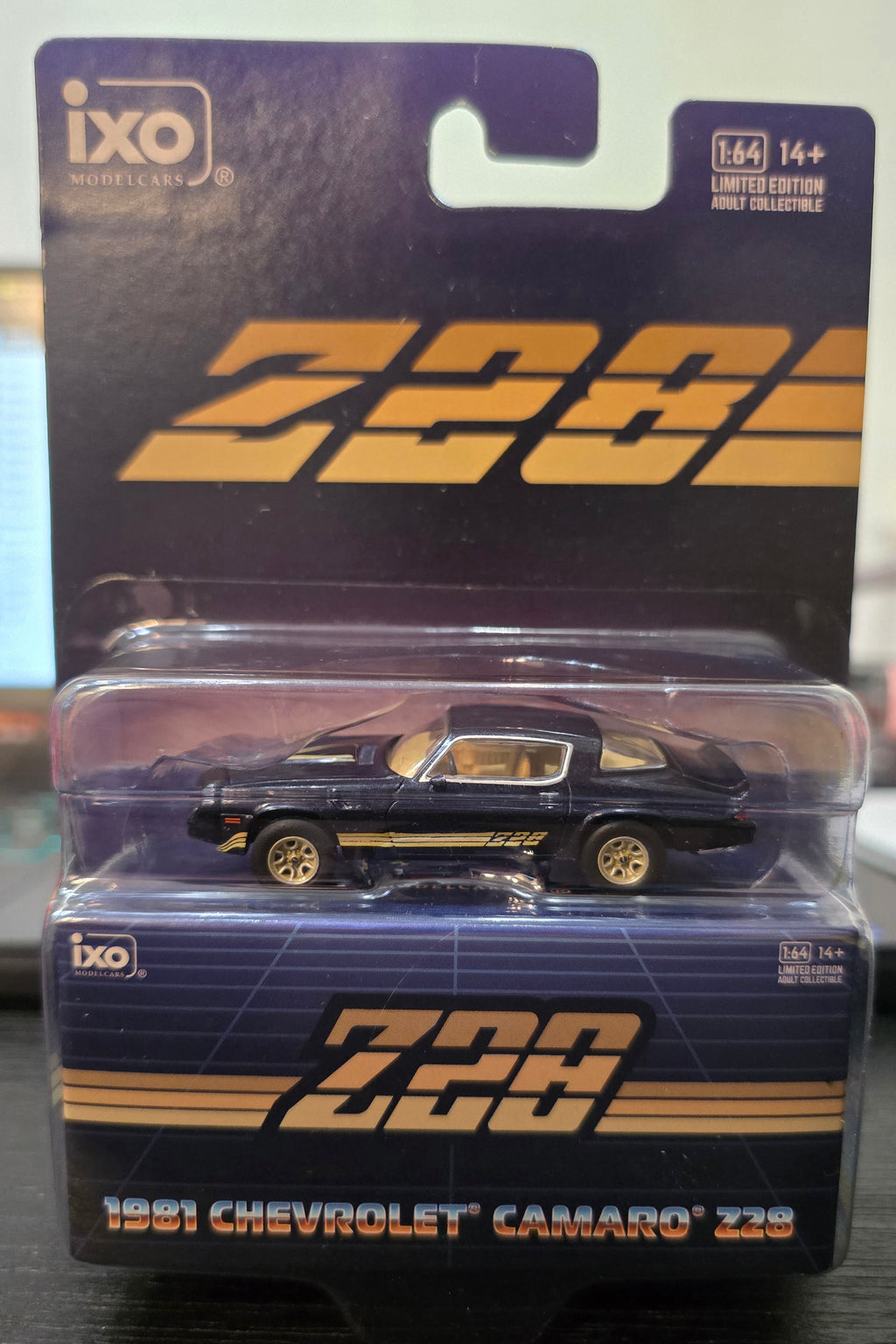 IXOAMERICA 1:64 Scale 1981 Chevrolet Camaro Z28 - Dark Blue Metallic with Gold Striping
