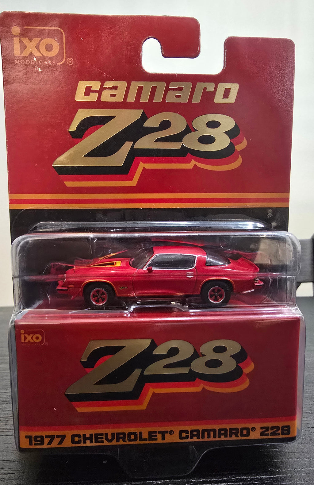 IXOAMERICA 1:64 Scale 1977 Chevrolet Camaro Z28 - Light Red