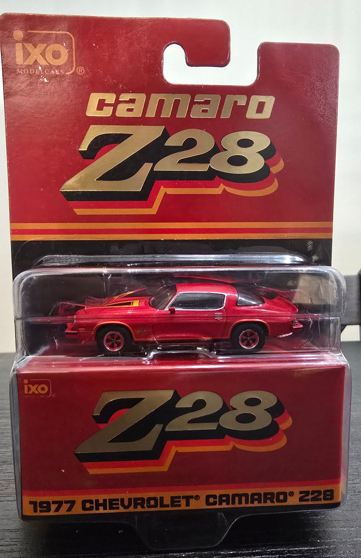 IXOAMERICA 1:64 Scale 1977 Chevrolet Camaro Z28 - Light Red