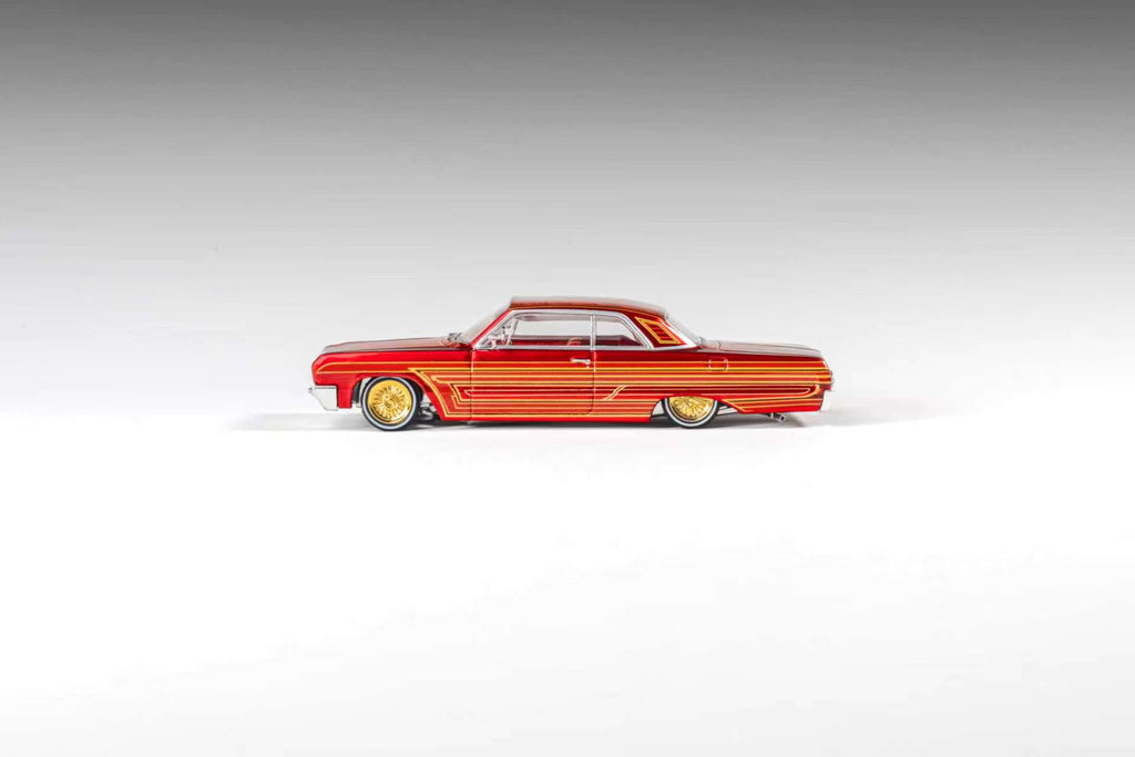 (Coming Soon) 97M 1:64 1964 Chevrolet Impala Low Rider Transparent Red