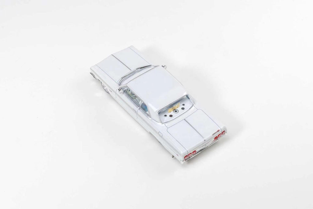 (Coming Soon) 97M 1:64 1964 Chevrolet Impala Low Rider Pearl White